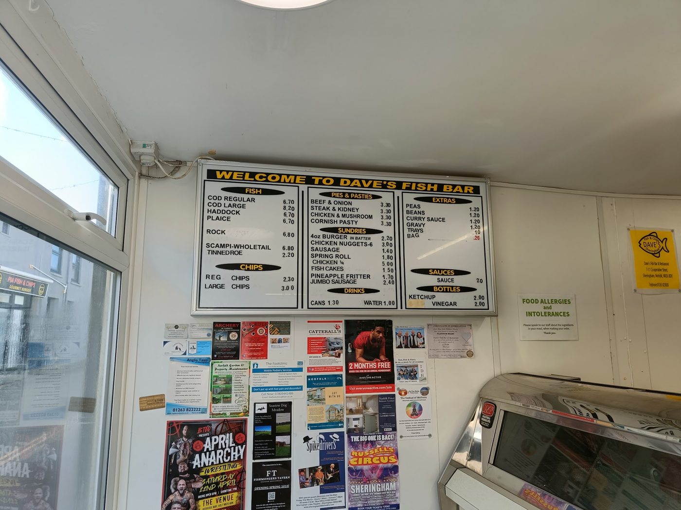 The menu boards above the takeaway counter